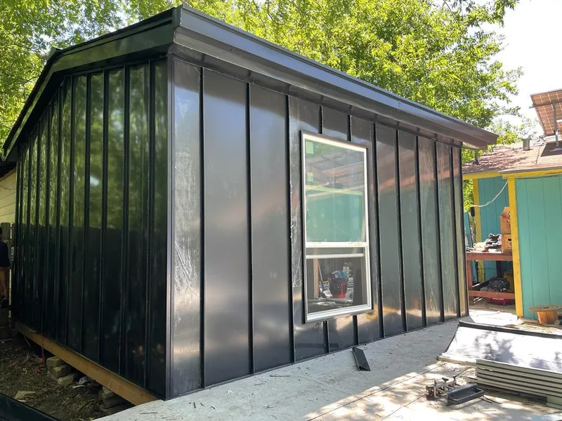 Black standing seam metal wall panels for Roof Inspection in Cramerton