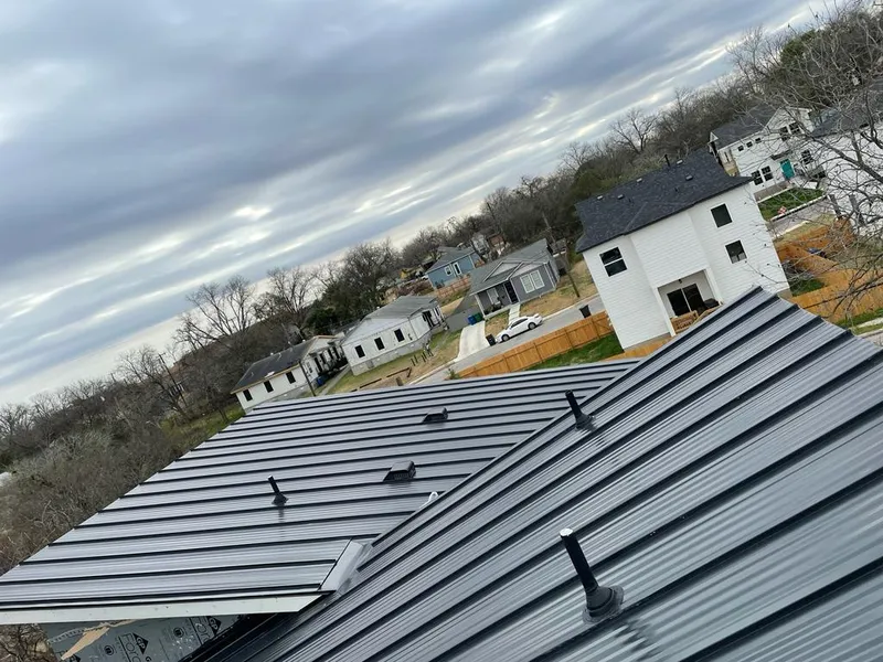 Standing seam metal roof panels with vents for Skylight Repair in Cramerton